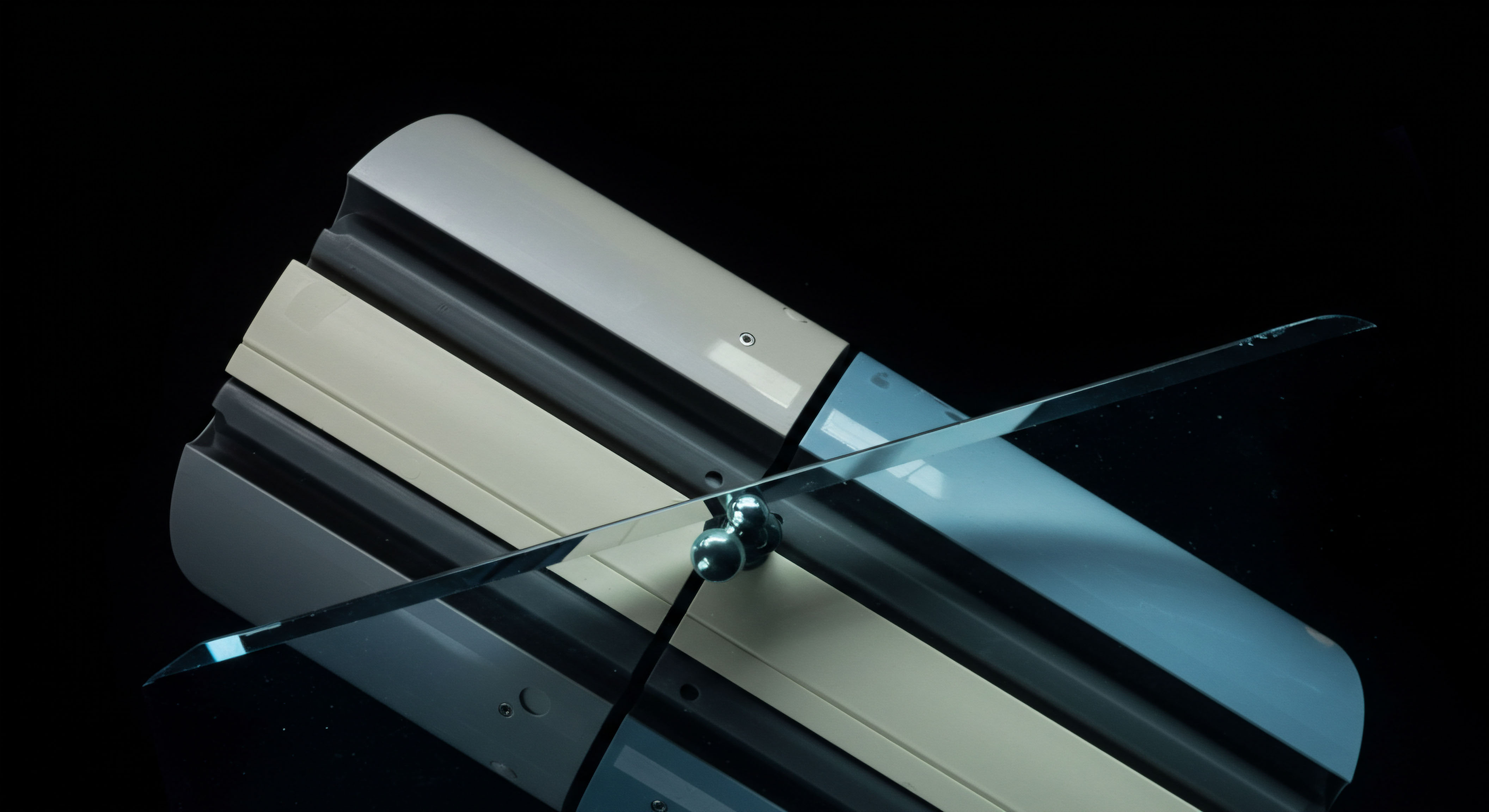 The image presents a sleek, dark backdrop contrasting with layered, segmented structures resembling structural components or layered data blocks, intersected by a sharply defined planar element, perhaps a blade or transparent surface, mounted centrally. This visual metaphor encapsulates the dynamic tension inherent in volatile crypto asset management, symbolizing complex derivative strategies. The segmented background evokes tiered collateralization structures or sequential batch processing within decentralized finance protocols. The intersecting plane signifies a finely calibrated strike price or a high-frequency trading execution line, crucial for delta hedging exotic options contracts. This configuration mirrors the architecture required for robust risk mitigation against sudden liquidity shocks and basis risk within synthetic asset creation, emphasizing the precision needed in navigating perpetual futures and options expiry scenarios across decentralized exchanges.