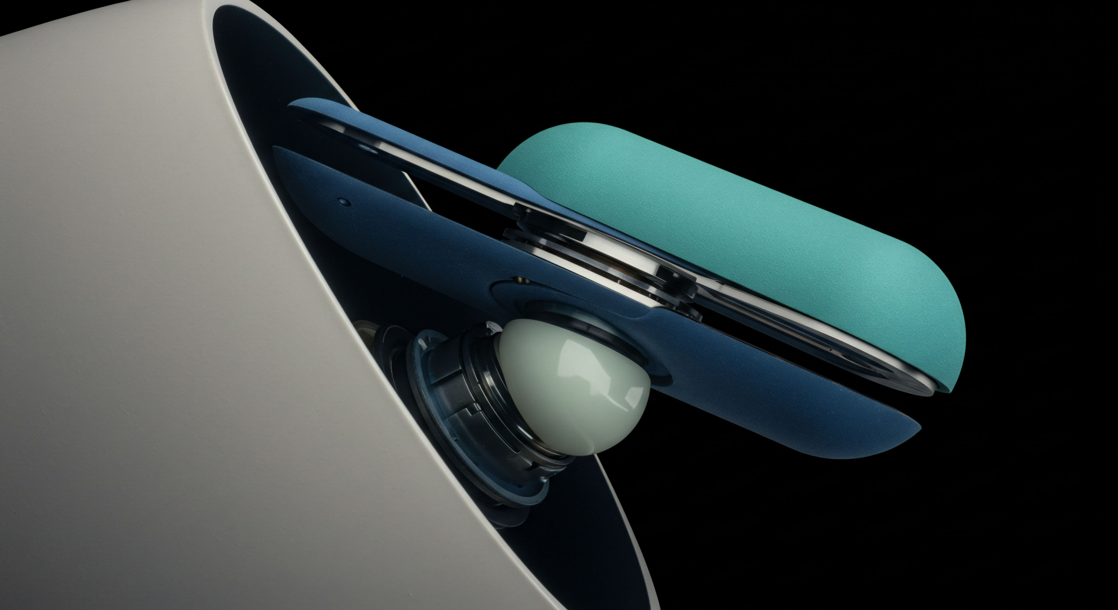 The visualization depicts a close-up of a finely engineered, seemingly mechanical component featuring a pale, translucent spherical joint nested within dark blue, polished housing elements contrasted against a thick, teal-colored, textured actuation pad, all emerging from a smooth, light gray chassis against a deep black void. This architecture metaphorically represents the critical role of secure hardware security modules HSMs in managing cryptographic key material for high-frequency options trading environments. The interplay suggests mechanical precision essential for minimizing latency in decentralized exchange order routing and safeguarding private keys against quantum adversaries seeking to exploit vulnerabilities in multi-signature cold storage solutions. Consider this the physical manifestation of secure enclave processing underpinning complex perpetual futures settlement mechanisms, balancing cold storage immutability with hot wallet responsiveness for arbitrage strategies leveraging transient liquidity pools.