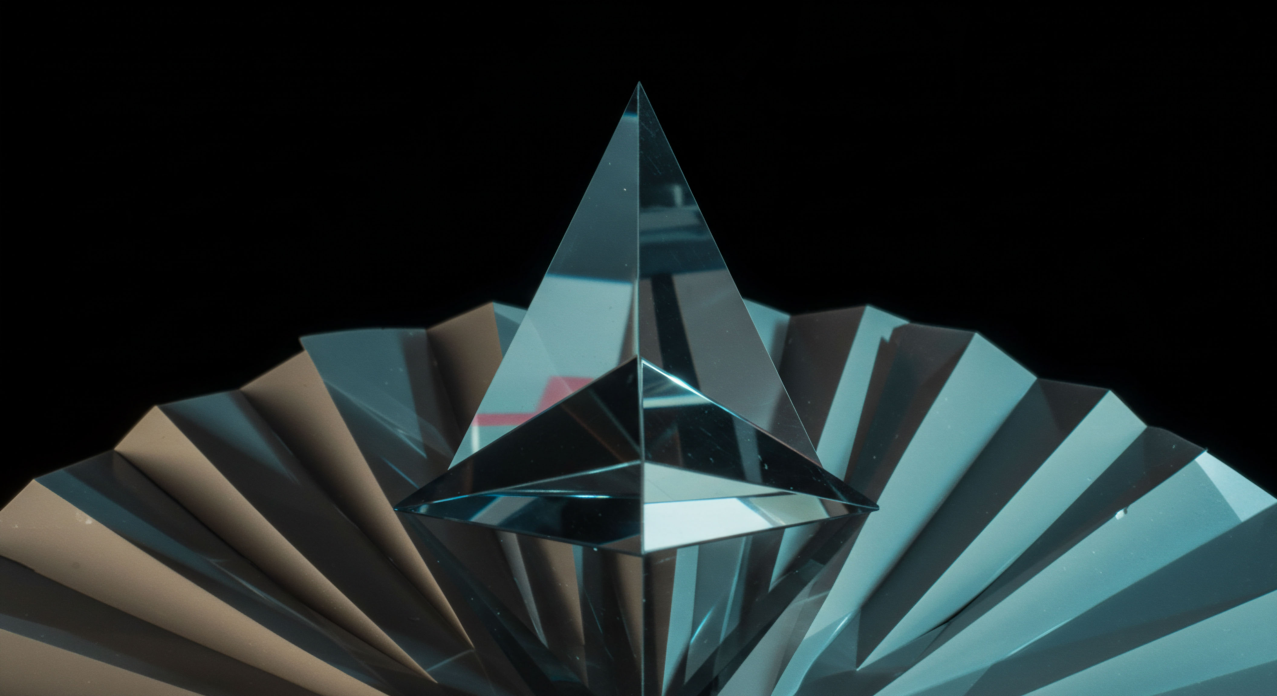 A sharply faceted, translucent, tetrahedral prism dominates a backdrop of radially pleated, reflective surfaces suggesting extreme market compression. This visualization models the sensitivity profile of synthetic yield-generating strategies within Decentralized Finance protocols, specifically highlighting the geometric complexity of implied volatility skews for exotic digital asset options. The central crystal signifies the strike price equilibrium point amidst fluctuating order book depth and rapid liquidity pooling. The surrounding folds illustrate discrete maturity curves and various tranche exposures in structured credit products. This arrangement captures the inherent non-linearity of Black-Scholes adaptations for perpetual futures and novel collateralized debt positions, emphasizing risk parity distribution across layered smart contract fortifications against liquidation cascades.
