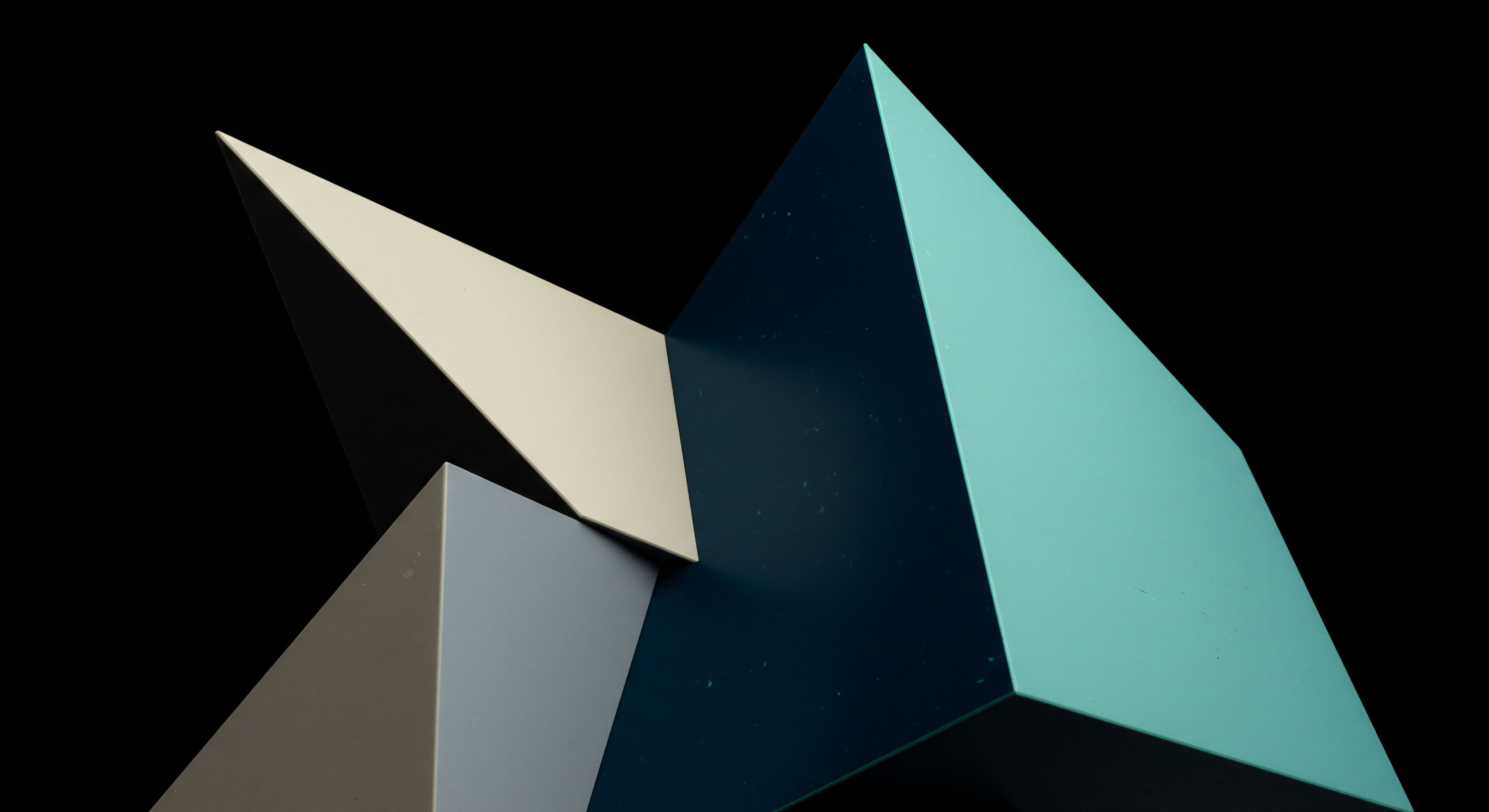 Sharp polygonal planes intersect against absolute darkness illustrating abstract market microstructure. A pale cream apex contrasts with a vibrant cyan facet and deep indigo shadow planes, suggesting directional momentum divergence within liquidity pools. This composition mirrors the complex interplay of strike price differentials and expiration decay influencing synthetic asset valuation. The sharp edges symbolize discrete ledger entries or immutable smart contract execution, embodying deterministic finality against volatile DeFi risk parameters. Key concepts include implied volatility skew gamma exposure hedging strategies and the non-linear payoff profiles intrinsic to perpetual swaps and structured products execution benchmarks.