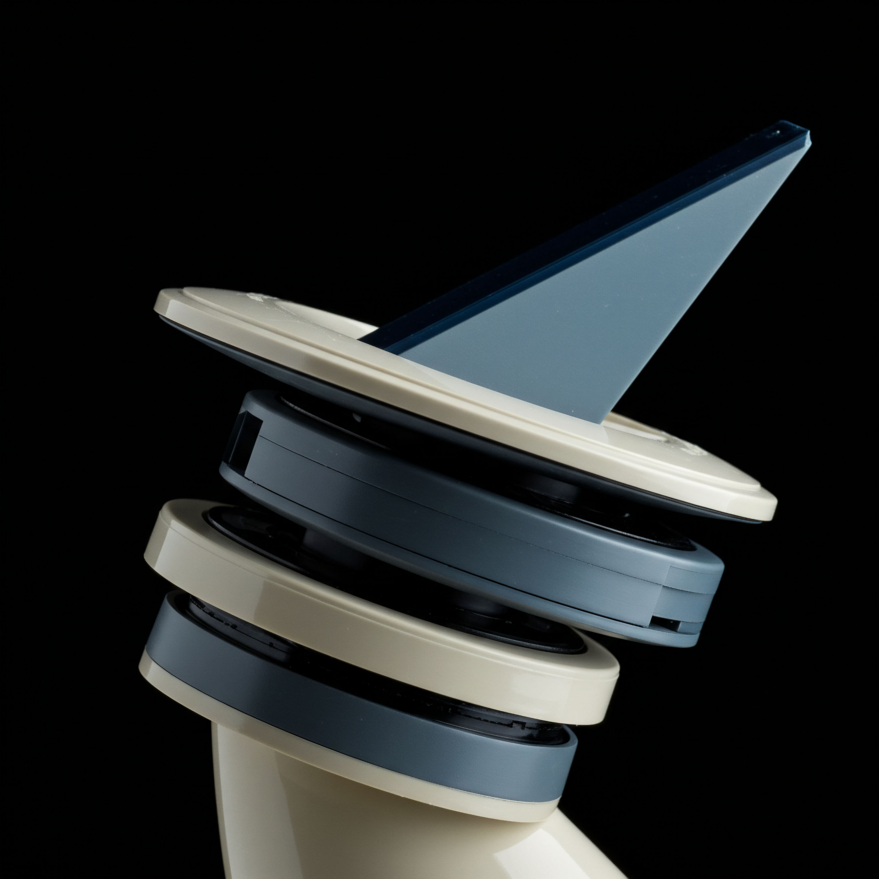 This abstract composition of stacked, interlocking beige and slate-blue plastic components, exhibiting a sharp, upward-projecting planar element, conceptually models the telescoping structure of complex decentralized finance primitive construction. The sequential layering suggests tiered risk stratification inherent in structured collateral pools underpinning sophisticated non-custodial perpetual swaps execution. The smooth, elevated spout mimics the directed flow required for oracle data transmission or controlled liquidation cascades within high-frequency crypto arbitrage. This visual architecture represents the deterministic mechanics of collateralized debt positions versus automated market maker slippage, reflecting the precise modularity needed for secure DeFi yield farming strategies and robust options delta hedging protocols against volatile spot price action.