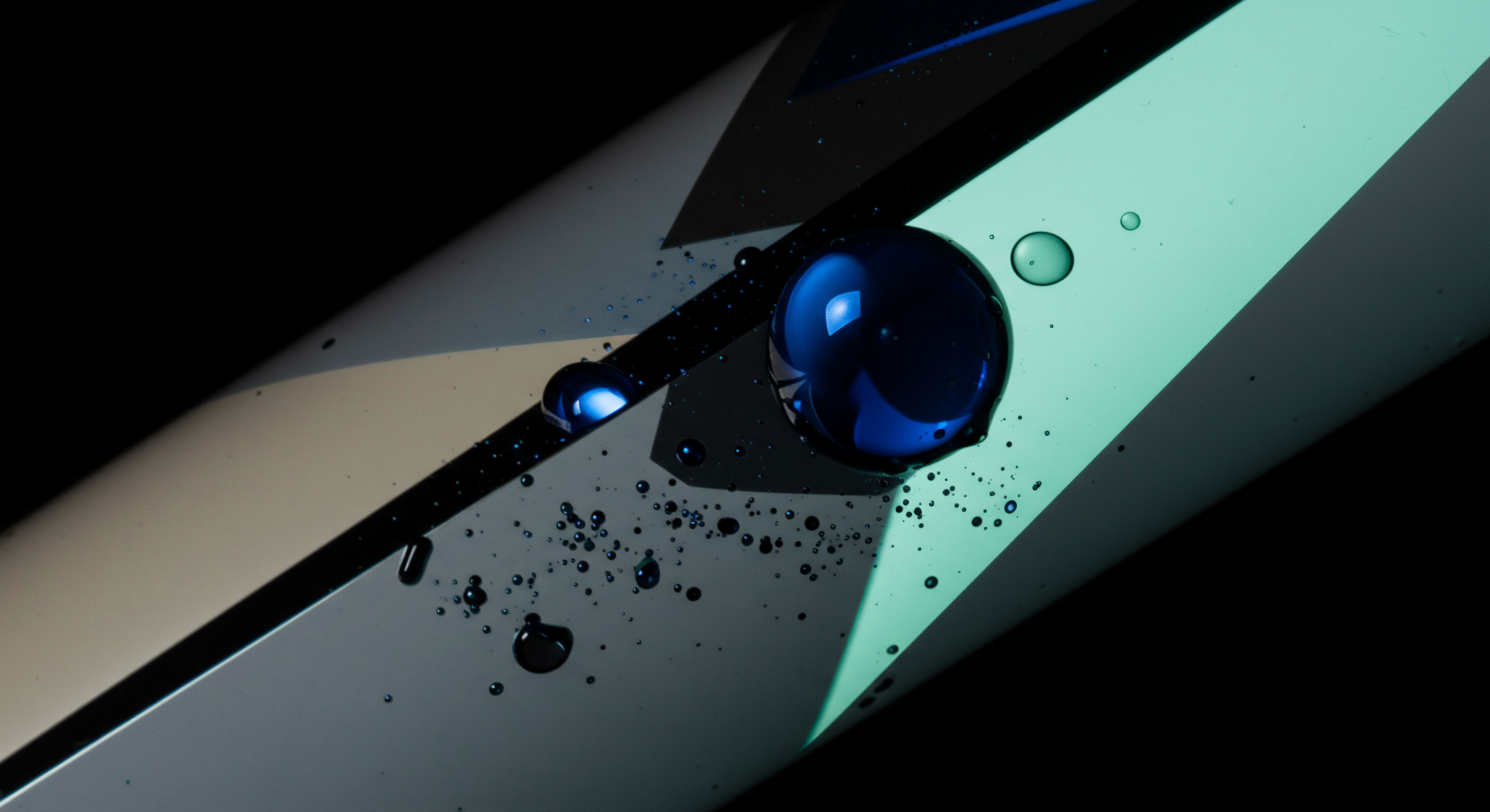 This abstract macro view captures viscous, deep indigo droplets coalescing upon a highly reflective, segmented surface exhibiting teal and pale gray tonalities, symbolizing emergent market structure. The large, spherical blue forms represent solidified capital concentration, perhaps indicative of deep layer whale movements or significant open interest in perpetual futures contracts. Smaller spheroids scatter, mirroring volatile bid ask discrepancies or slippage associated with low-volume order book depth. The sharp geometric divisions suggest discrete trading venues or tranche separation within structured products like credit risk transfer instruments on-chain. This visual metaphor addresses the opaque nature of off-exchange liquidity sourcing versus transparent DEX settlement mechanisms when analyzing risk parity in high-frequency crypto options execution across varying implied volatility surfaces. The high sheen reflects latent arbitrage opportunities amid fractured decentralized finance infrastructures and dark book exposures.