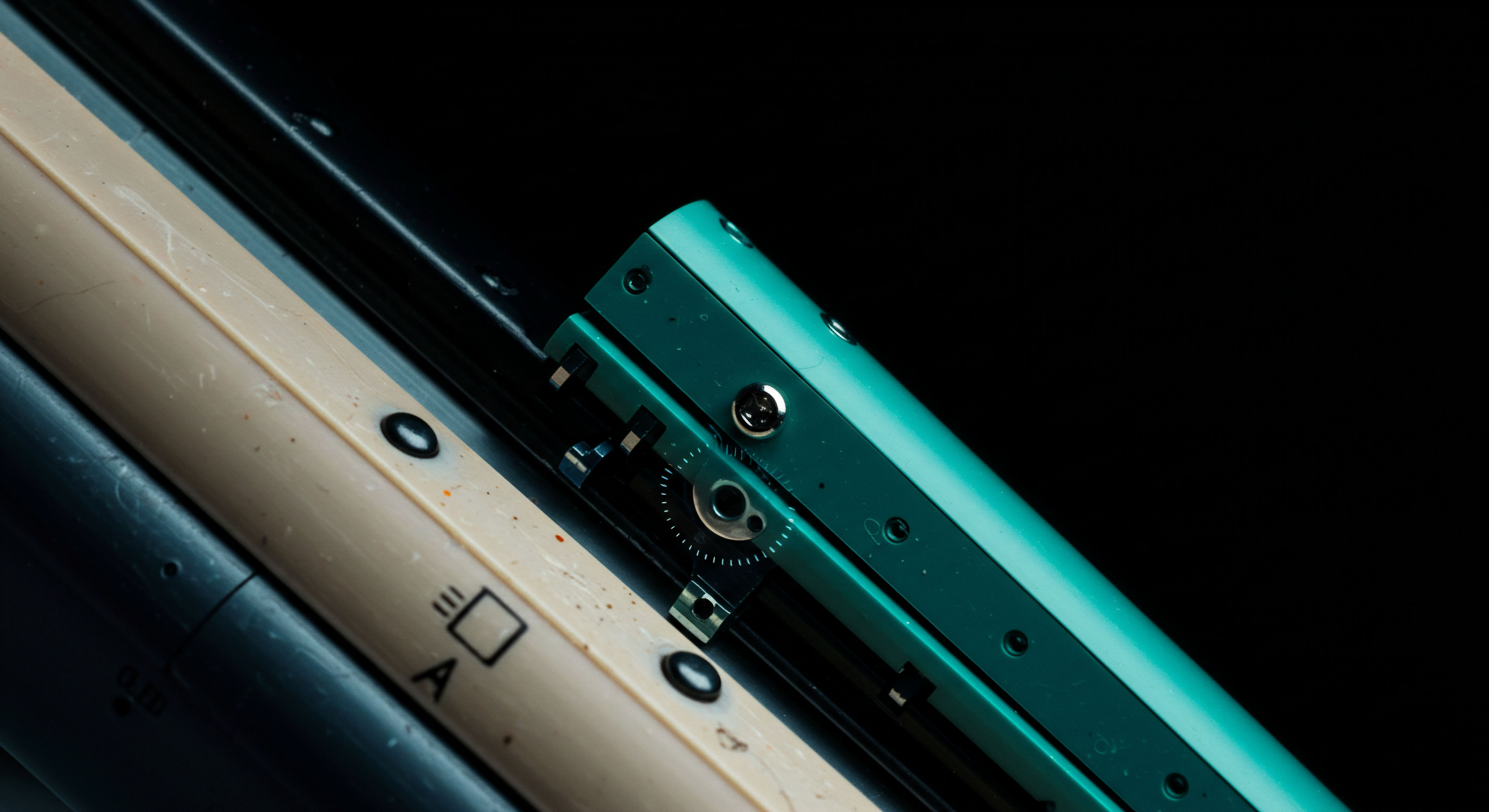 The close-up reveals a juxtaposition of aged beige polymer featuring faint operational symbols adjacent to a vibrant cyan mechanical assembly incorporating finely pitched gearing and precision fasteners. This visual interaction models the intricate, often opaque, mechanics underlying decentralized finance protocols, specifically mimicking the execution fidelity required for high-frequency crypto options trading. The tactile difference between the weathered component and the clean turquoise structure symbolizes the evolution from legacy market infrastructure to modern on-chain settlement layers like layer-two scaling solutions affecting derivative liquidity provisioning. Observe the micro-adjustments indicated by the exposed ratchet wheel suggesting continuous delta hedging strategies within perpetual futures contracts or volatility surface calibration in exotic crypto derivatives requiring robust oracle integration. This highlights systemic reliance on verifiable on-chain primitives for fair derivative pricing.