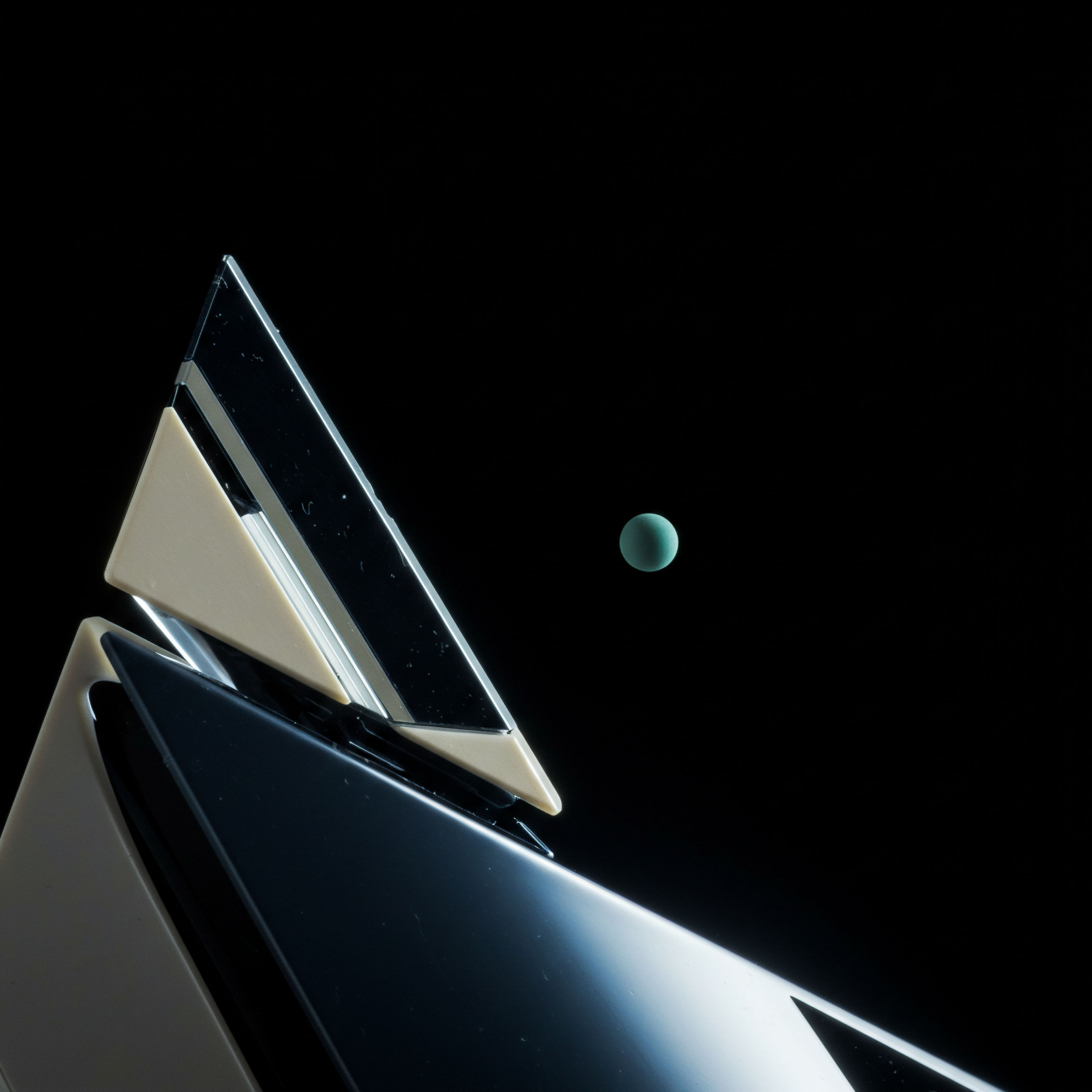 This stark composition presents sharp, angular, obsidian and ivory geometric structures contrasting against a void like a nascent DeFi protocol structure. A solitary, luminous cyan sphere floats centrally evoking the implied volatility measurement of a perpetual futures contract or a synthetic asset token. The sleek, reflective surfaces suggest optimal execution pathways for high-frequency market making operations. The structural apex implies a critical resistance level or a hard cap settlement point within complex structured products architecture. This visual metaphor encompasses concepts of capital efficiency arbitrage opportunities and the precision required for algorithmic option pricing models utilizing Black Scholes modifications for decentralized finance instruments.