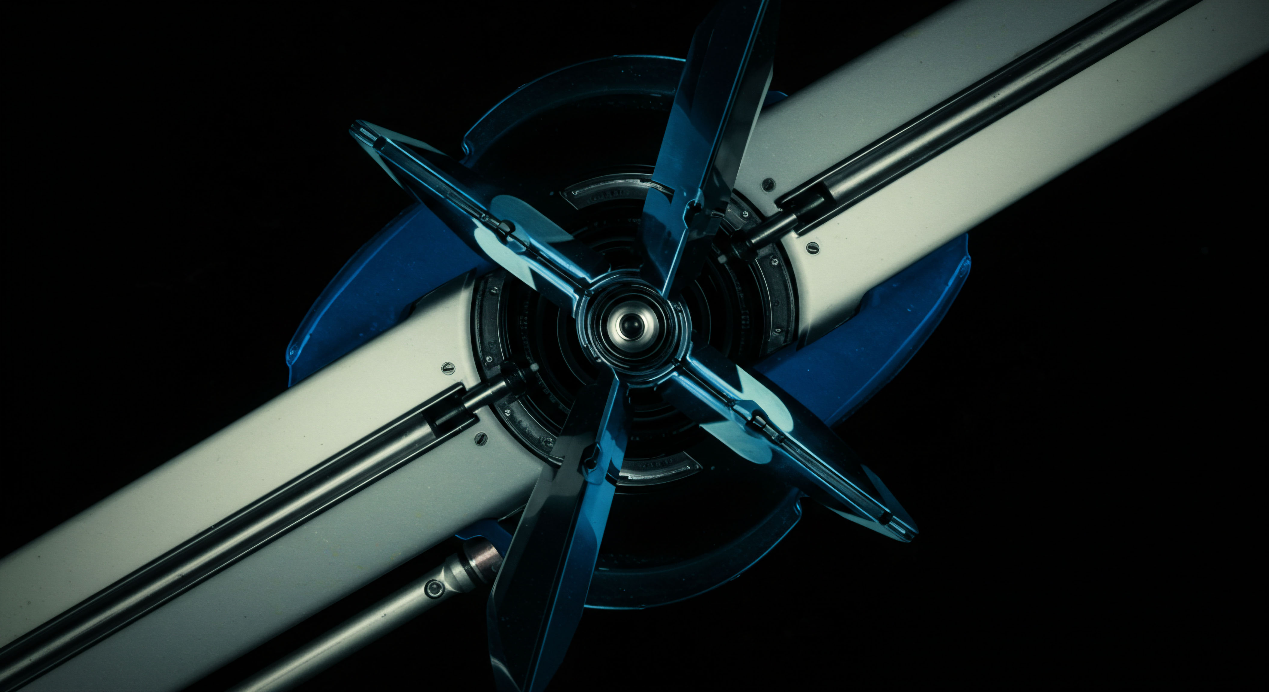 The high-contrast rendering depicts a complex, metallic hub assembly featuring four stylized blades suggesting rapid rotation or potential energy storage against a stark black background. This visual metaphor speaks to the high-frequency transactional throughput inherent in modern digital asset exchange mechanisms and the structured complexity of Black Scholes modeling applied to exotic options valuation. The polished surfaces reflect deep azure illumination mirroring liquidity pool dynamics and slippage mitigation protocols within Automated Market Makers AMMs. Key concepts include high-throughput consensus mechanisms, implied volatility surfaces calibration, perpetual futures hedging strategies, algorithmic execution sequencing, and synthetic asset creation frameworks underpinning robust DeFi infrastructure. This kinetic symmetry symbolizes controlled leverage deployment against unpredictable market microstructure.